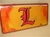 Louisville Cardinals On Fire Lenticular License Plate